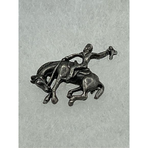 Antique Jewelry - Antique silver little bucking bronco rider pin with C-Clasp